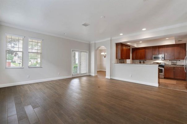 Chandelier, Empty room, Interior, Kitchen, Recessed Lighting, Stainless Steel Appliances, Wood Texture Flooring