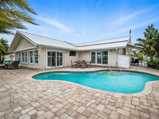 Exterior, Pool, Solar Panels