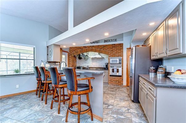 Interior, Kitchen, Recessed Lighting, Stainless Steel Appliances, Stone Walls