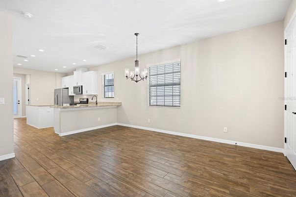 Chandelier, Empty room, Interior, Kitchen, Pendant Lights, Recessed Lighting, Wood Texture Flooring