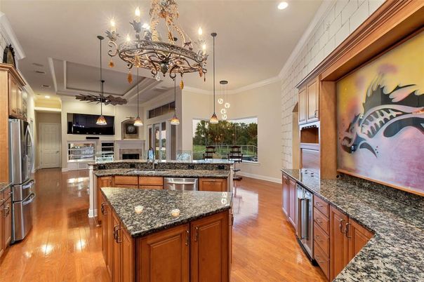 Chandelier, Interior, Kitchen, Pendant Lights, Recessed Lighting, Stainless Steel Appliances, Wood Texture Flooring