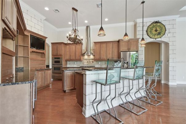 Chandelier, Interior, Kitchen, Pendant Lights, Recessed Lighting, Stainless Steel Appliances, Wood Texture Flooring