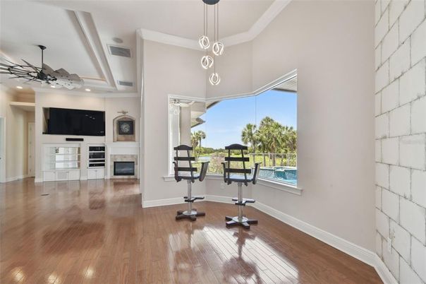 Fireplace, Fitness Equipment, Interior, Pendant Lights, Recessed Lighting, Wood Texture Flooring