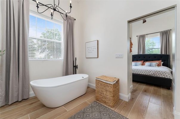 Bathroom, Bedroom, Chandelier, Free Standing Baths, Interior, Wood Texture Flooring