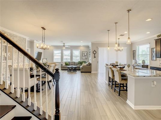 Chandelier, Dining room, Interior, Kitchen, Living room, Pendant Lights, Recessed Lighting, Wood Texture Flooring