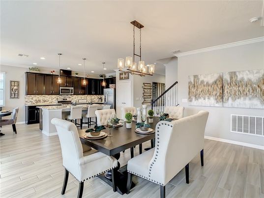 Dining room, Interior, Kitchen, Pendant Lights, Recessed Lighting, Stainless Steel Appliances, Wood Texture Flooring