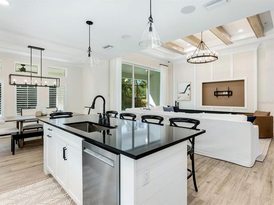 Chandelier, Dining room, Interior, Kitchen, Living room, Pendant Lights, Recessed Lighting, Wooden Beams, Wood Texture Flooring
