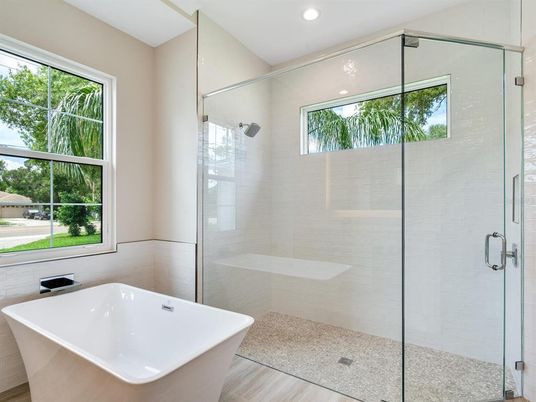 Bathroom, Free Standing Baths, Glass Shower, Interior, Recessed Lighting, Wood Texture Flooring