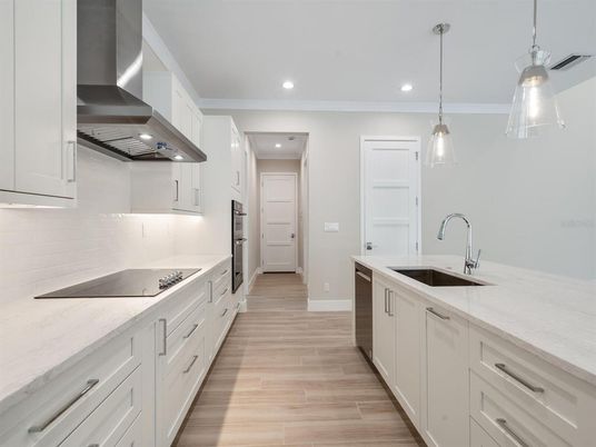 Interior, Kitchen, Pendant Lights, Recessed Lighting, Stainless Steel Appliances, Wood Texture Flooring