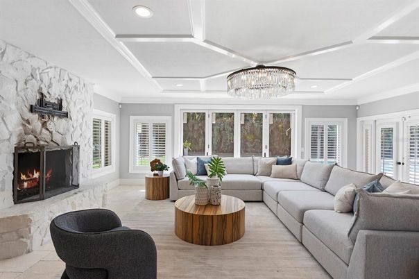 Chandelier, Fireplace, Interior, Living room, Recessed Lighting, Wood Texture Flooring