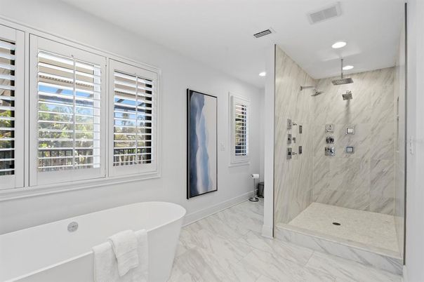 Bathroom, Free Standing Baths, Glass Shower, Interior, Marble, Marble Walls, Recessed Lighting