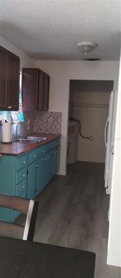 Interior, Kitchen, Tile Countertops, Wood Texture Flooring