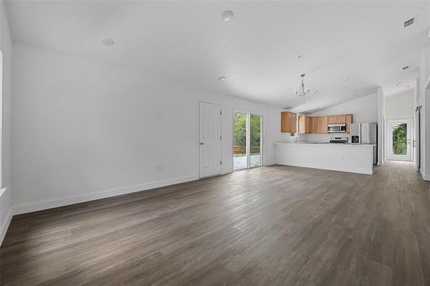 Chandelier, Empty room, Interior, Kitchen, Stainless Steel Appliances, Wood Texture Flooring