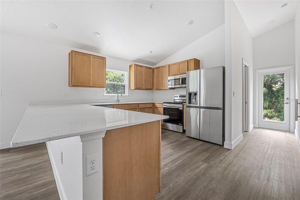 Interior, Kitchen, Recessed Lighting, Stainless Steel Appliances, Wood Texture Flooring