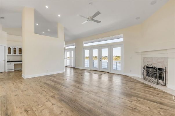 Empty room, Fireplace, Interior, Recessed Lighting, Wood Texture Flooring