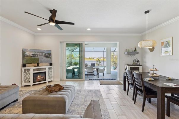 Dining room, Fireplace, Interior, Living room, Pendant Lights, Recessed Lighting, Wood Texture Flooring