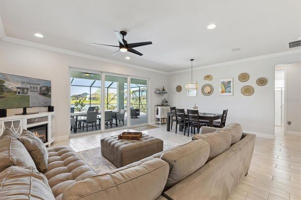 Dining room, Fireplace, Interior, Living room, Pendant Lights, Recessed Lighting, Wood Texture Flooring