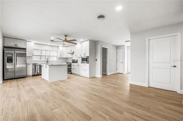 Interior, Kitchen, Recessed Lighting, Stainless Steel Appliances, Wood Texture Flooring