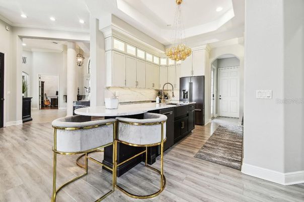 Interior, Kitchen, Marble Walls, Pendant Lights, Recessed Lighting, Wood Texture Flooring