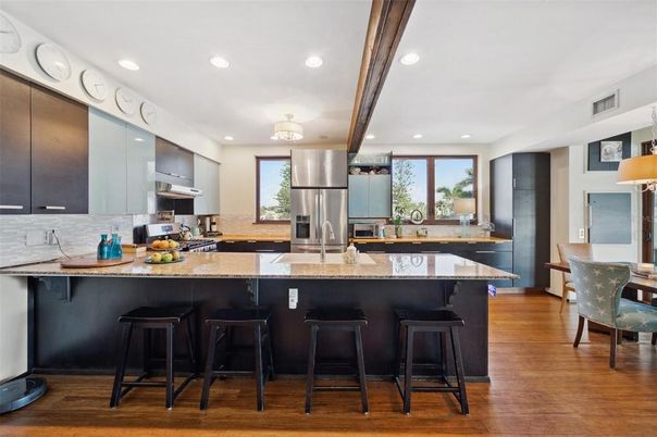 Dining room, Interior, Kitchen, Recessed Lighting, Stainless Steel Appliances, Wood Texture Flooring