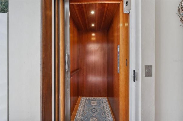 Elevator, Interior, Recessed Lighting, Wooden Ceilings, Wooden Walls
