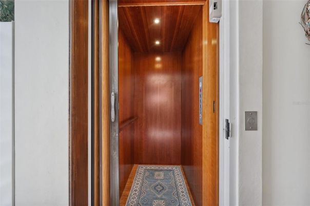 Elevator, Interior, Recessed Lighting, Wooden Ceilings, Wooden Walls