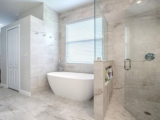 Bathroom, Free Standing Baths, Glass Shower, Interior, Marble, Marble Walls, Recessed Lighting