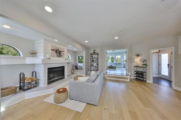 Fireplace, Interior, Living room, Recessed Lighting, Wood Texture Flooring