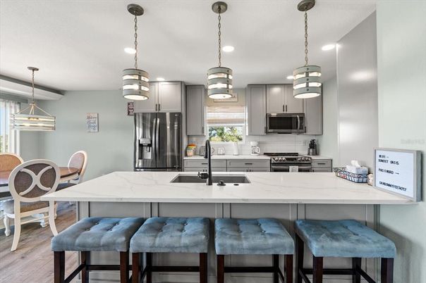 Interior, Kitchen, Pendant Lights, Recessed Lighting, Stainless Steel Appliances, Wood Texture Flooring