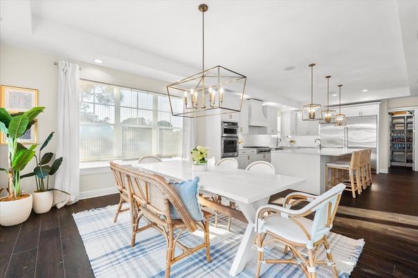 Dining room, Interior, Kitchen, Pendant Lights, Recessed Lighting, Stainless Steel Appliances, Wood Texture Flooring