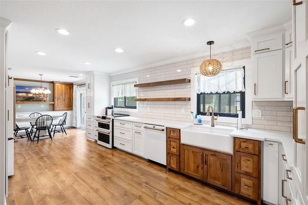Dining room, Interior, Kitchen, Pendant Lights, Recessed Lighting, Stainless Steel Appliances, Wood Texture Flooring