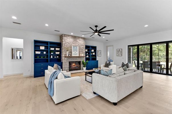 Fireplace, Interior, Living room, Recessed Lighting, Stone Walls, Wood Texture Flooring