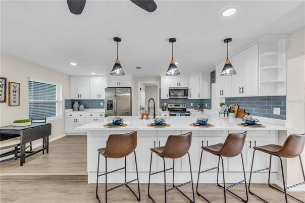 Interior, Kitchen, Pendant Lights, Recessed Lighting, Stainless Steel Appliances, Wood Texture Flooring