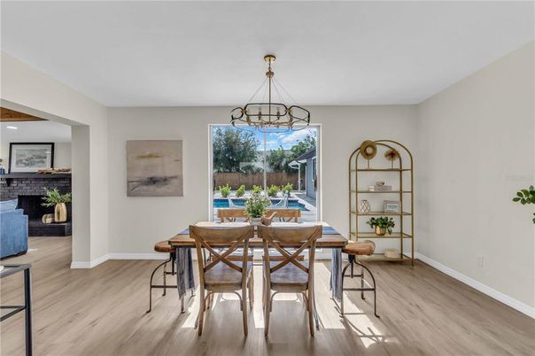 Dining room, Fireplace, Interior, Pendant Lights, Wood Texture Flooring