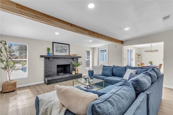 Fireplace, Interior, Living room, Pendant Lights, Recessed Lighting, Wooden Beams, Wood Texture Flooring