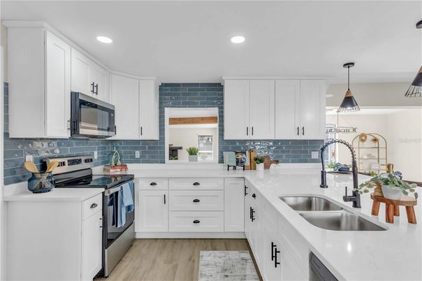 Interior, Kitchen, Pendant Lights, Recessed Lighting, Stainless Steel Appliances, Wood Texture Flooring
