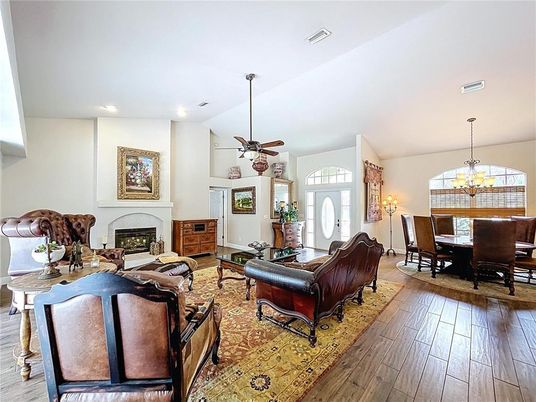 Chandelier, Dining room, Fireplace, Interior, Living room, Recessed Lighting, Wood Texture Flooring