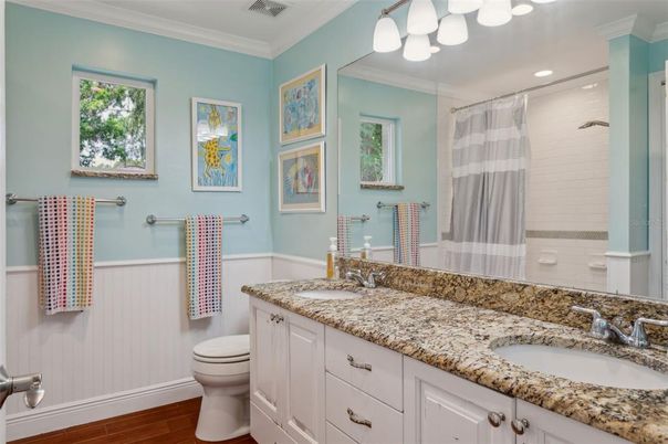 Bathroom, Dual Sink Vanities, Interior, Recessed Lighting, Wood Texture Flooring