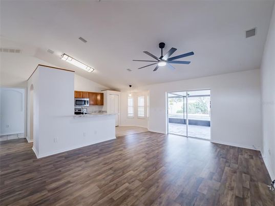 Empty room, Interior, Kitchen, Stainless Steel Appliances, Wood Texture Flooring