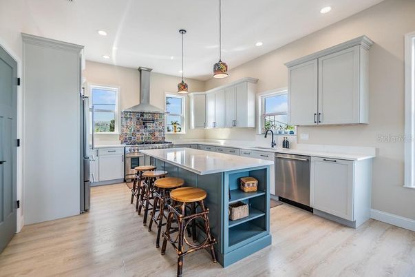 Interior, Kitchen, Pendant Lights, Recessed Lighting, Stainless Steel Appliances, Wood Texture Flooring
