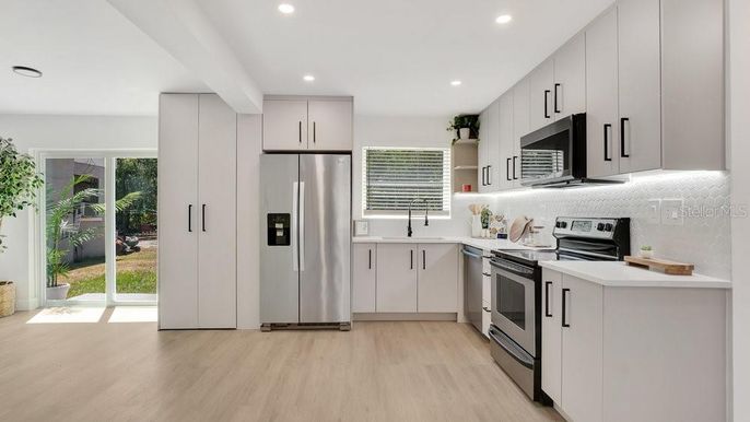 Interior, Kitchen, Recessed Lighting, Stainless Steel Appliances, Wood Texture Flooring