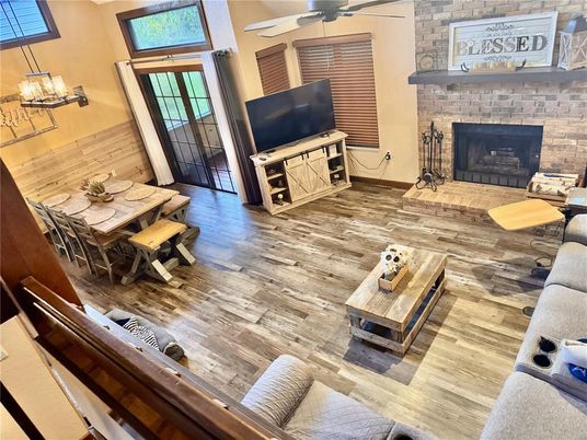Dining room, Fireplace, Interior, Living room, Stone Walls, Wood Texture Flooring