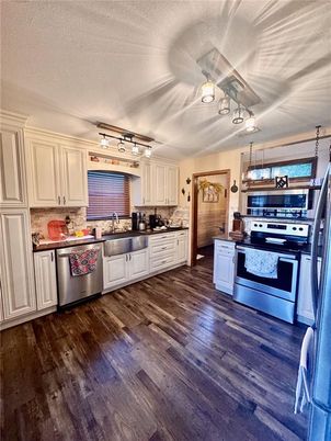 Interior, Kitchen, Pendant Lights, Stainless Steel Appliances, Wood Texture Flooring