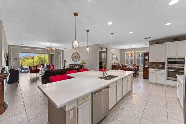 Chandelier, Dining room, Interior, Kitchen, Living room, Pendant Lights, Recessed Lighting, Stainless Steel Appliances