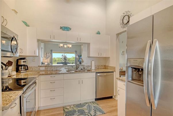 Interior, Kitchen, Pendant Lights, Stainless Steel Appliances, Wood Texture Flooring