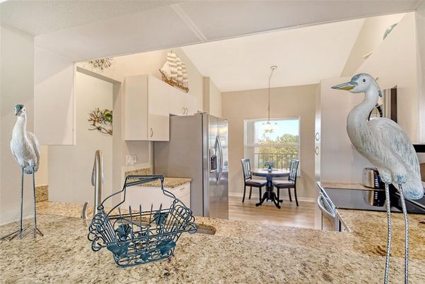 Dining room, Interior, Kitchen, Pendant Lights, Stainless Steel Appliances, Wood Texture Flooring