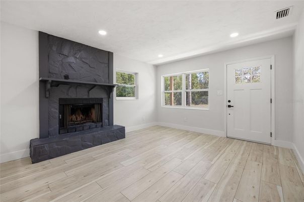 Empty room, Fireplace, Interior, Recessed Lighting, Wood Texture Flooring