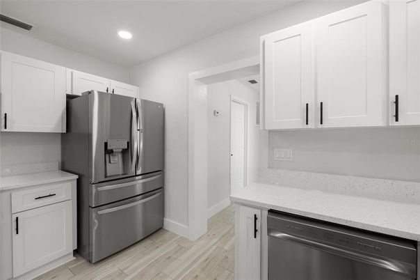 Interior, Kitchen, Recessed Lighting, Stainless Steel Appliances, Wood Texture Flooring