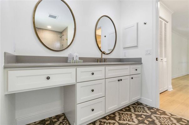 Bathroom, Dual Sink Vanities, Interior, Recessed Lighting, Wood Texture Flooring