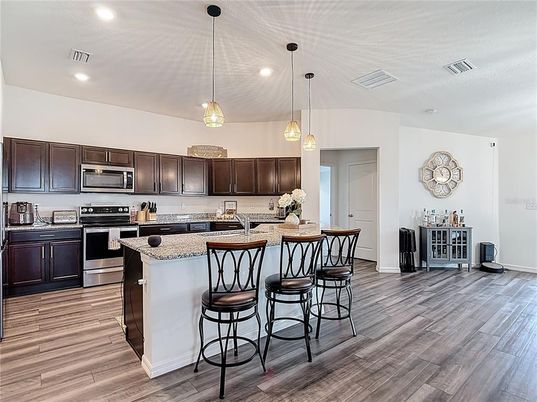 Interior, Kitchen, Pendant Lights, Recessed Lighting, Stainless Steel Appliances, Wood Texture Flooring